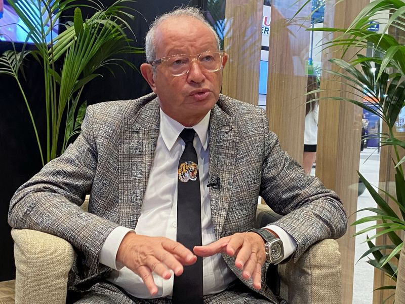 Naguib Sawiris, one of Egypt's richest businessmen, speaks during an interview with Reuters in Dubai