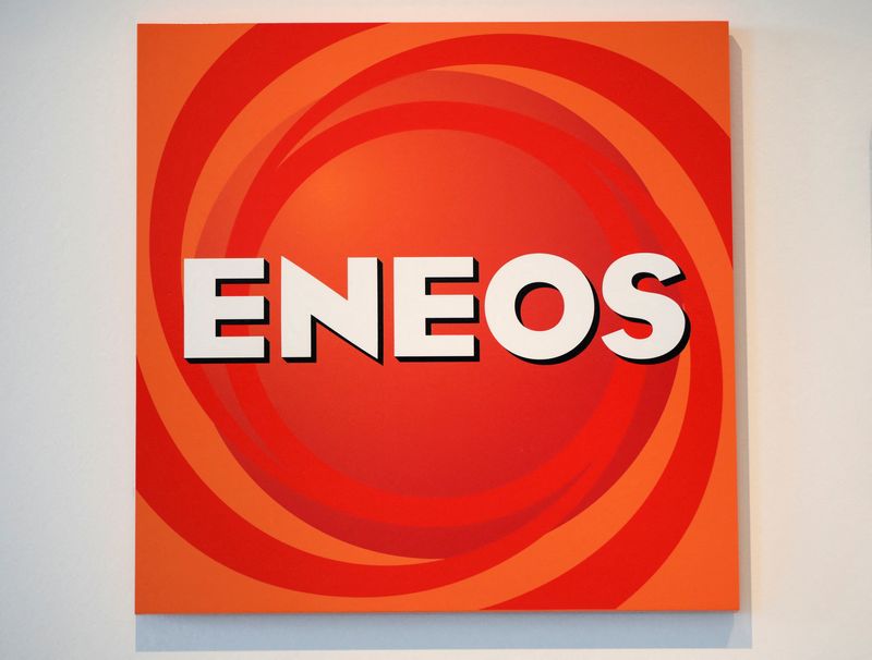 The logo of Eneos Holdings and Eneos Corporation is displayed at the company headquarters in Tokyo