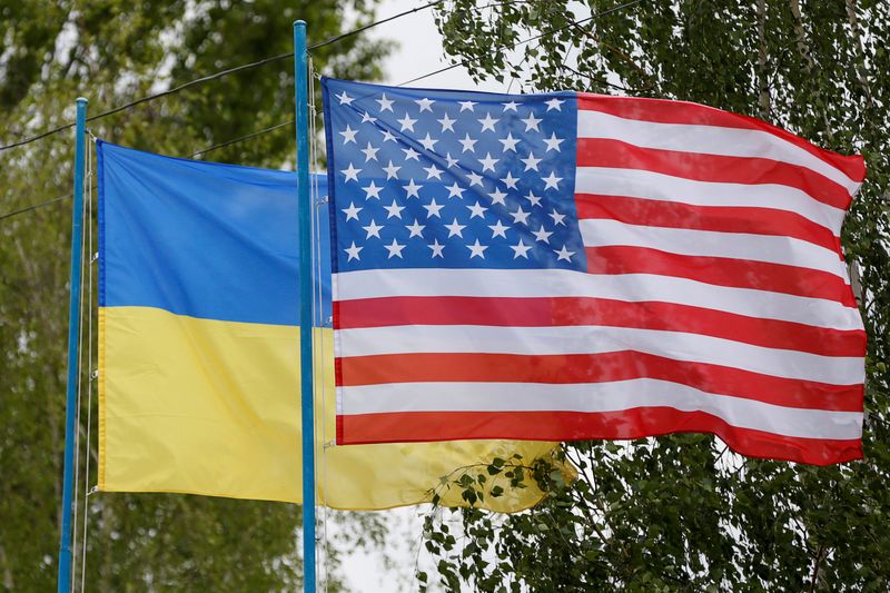 National flags of Ukraine and U.S. fly at compound of police training base outside Kiev