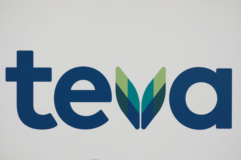 FILE PHOTO: The logo of Teva Pharmaceutical Industries is seen during a news conference in Tel Aviv