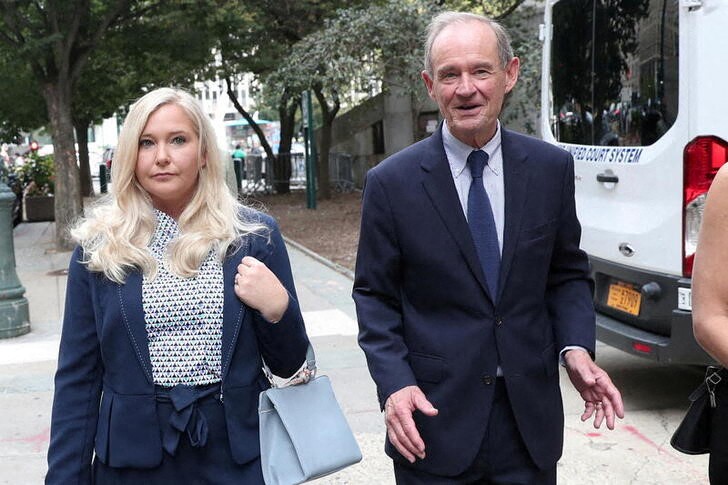 FILE PHOTO: Lawyer David Boies arrives with his client Virginia Giuffre for hearing in the criminal case against Jeffrey Epstein, at Federal Court in New York