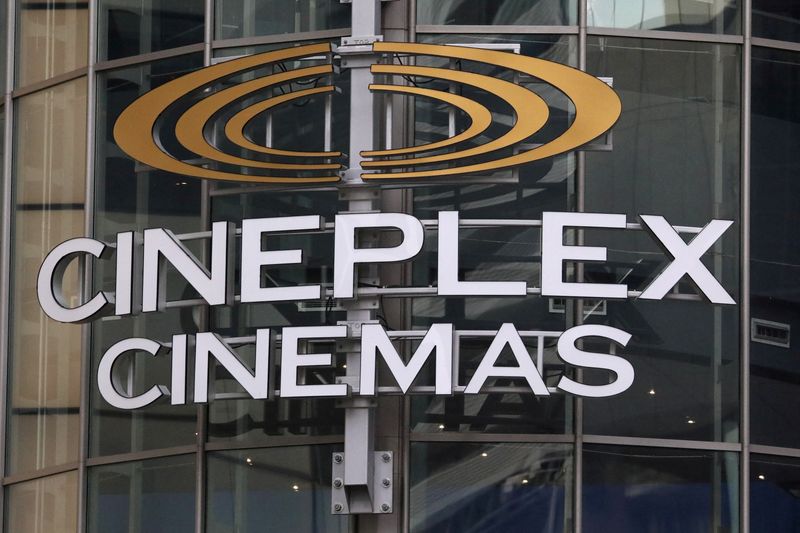 FILE PHOTO: A Cineplex movie theater sign looms over Yonge street in Toronto