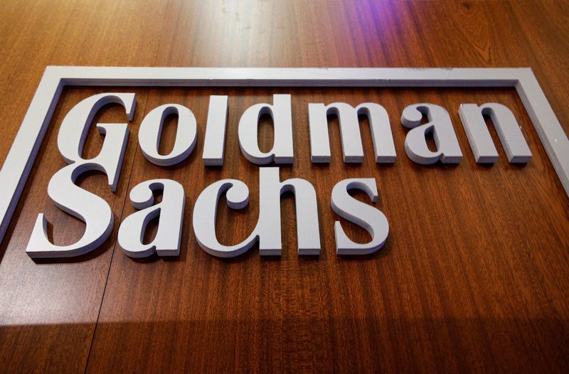 FILE PHOTO: FILE PHOTO: The Goldman Sachs company logo is on the floor of the NYSE in New York