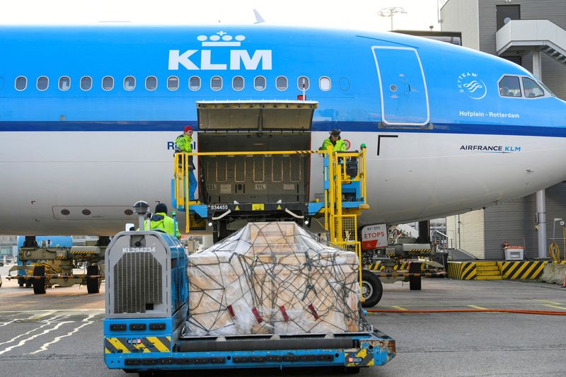 FILE PHOTO: Cooled packages are being transported by airplane at Amsterdam's Schiphol Airport