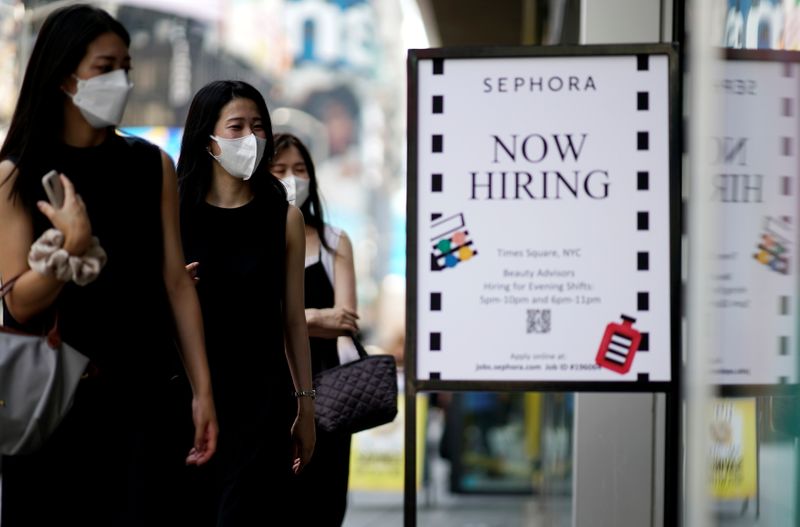 FILE PHOTO: A sign advertising job openings is seen in New York