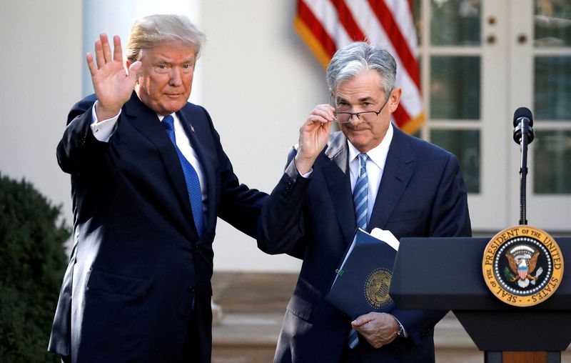 FILE PHOTO: Then-U.S. President Donald Trump gestures with Jerome Powell, his nominee to become chairman of the U.S. Federal Reserve at the White House in Washington