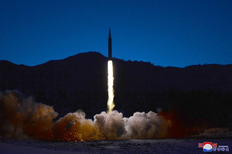FILE PHOTO: A missile is launched during what state media report is a hypersonic missile test at an undisclosed location in North Korea