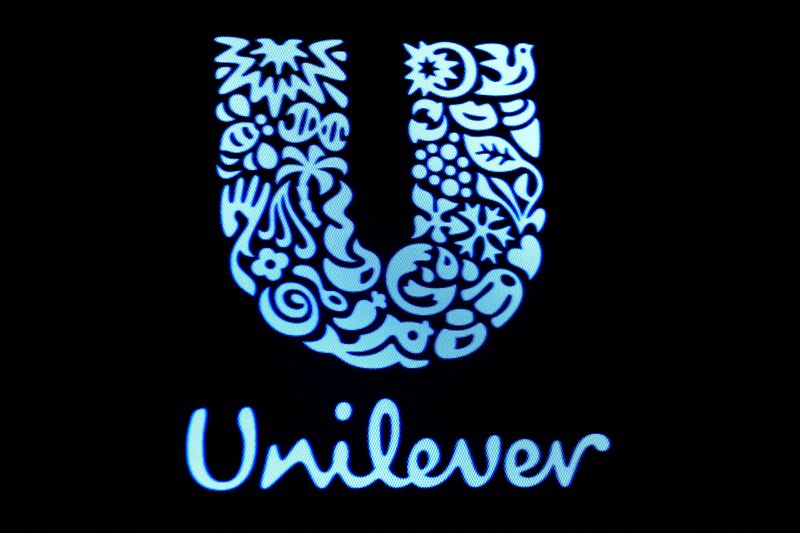 FILE PHOTO: The company logo for Unilever is displayed on a screen on the floor of the NYSE