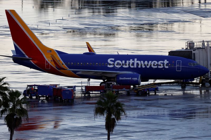 FILE PHOTO: A Southwest Airlines jet sits at a gate at Orlando International Airport in Orlando