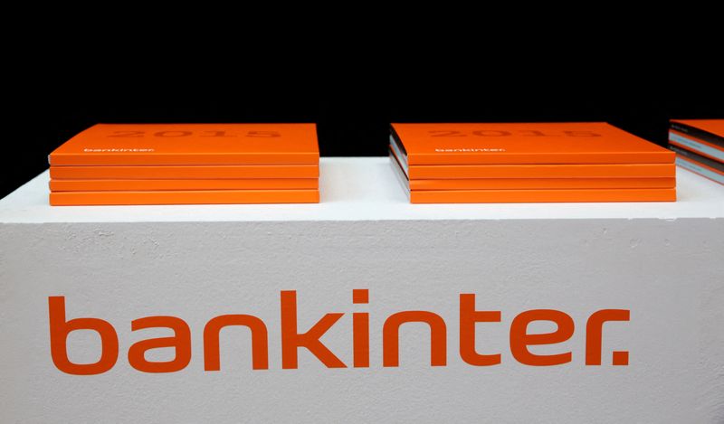 FILE PHOTO: A Bankinter logo and books containing annual results can be seen during the annual shareholder meeting in Madrid, Spain