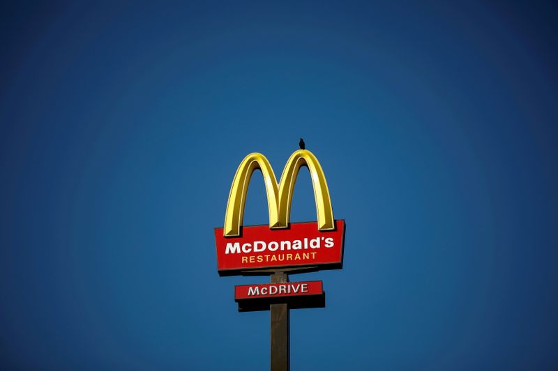 FILE PHOTO: The McDonald's company logo stands on a sign outside a restaurant in Bretigny-sur-Orge, near Paris