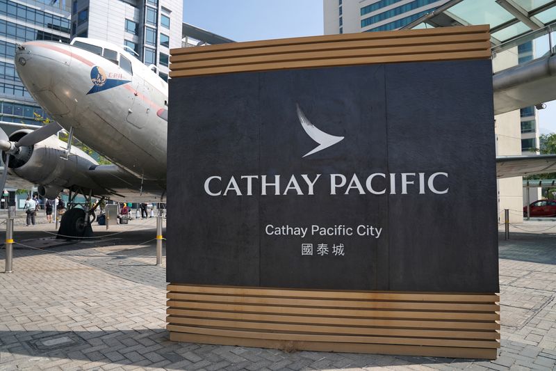 FILE PHOTO: FILE PHOTO: Sign of Cathay Pacific is seen at its  headquarters Cathay City in Hong Kong