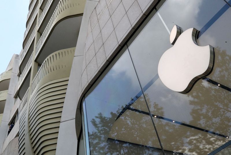 FILE PHOTO: The Apple Inc logo is seen at the entrance to the Apple store in Brussels