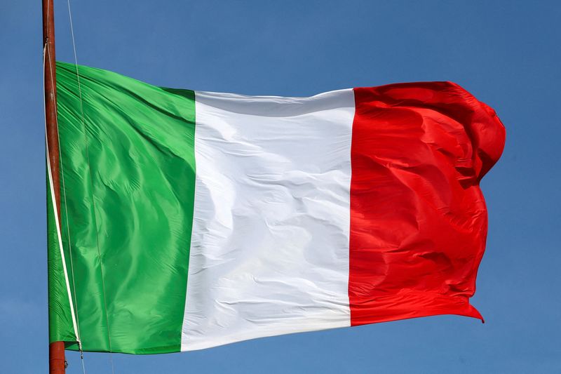 FILE PHOTO: The Italian flag waves in front of The 