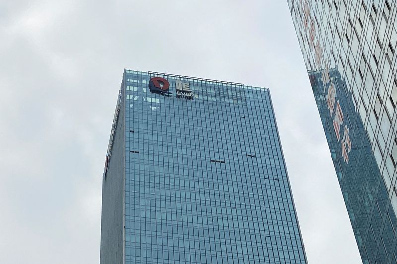 FILE PHOTO: Partially removed company logo of China Evergrande Group in Shenzhen