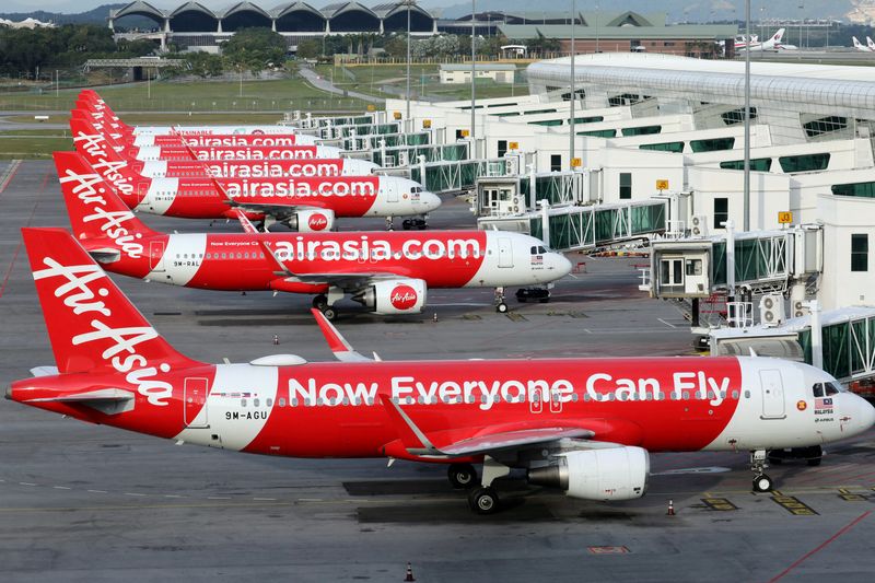 FILE PHOTO: Airasia planes are seen parked at Kuala Lumpur International Airport 2, amid the coronavirus disease (COVID-19) outbreak in Sepang