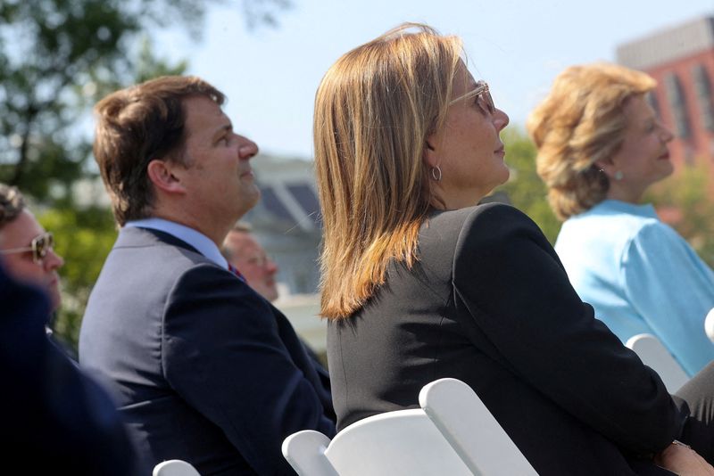 FILE PHOTO: The CEOs of Ford and GM, Farley and Barra, are pictured at an event in Washington