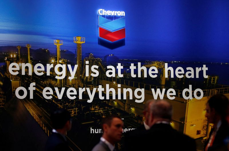 FILE PHOTO: The logo of Chevron Corp is seen in its booth at Gastech, the world's biggest expo for the gas industry, in Chiba
