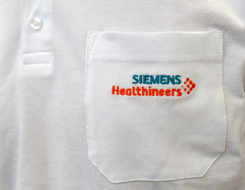 FILE PHOTO: FILE PHOTO: Siemens Healthineers logo is seen on an item of clothing in manufacturing plant in Forchheim