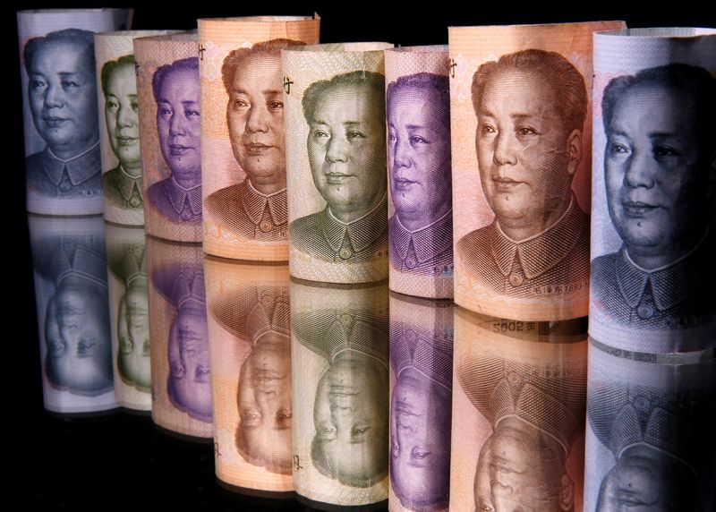 Chinese Yuan banknotes are seen in this illustration