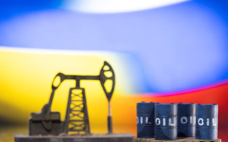 Models of oil barrels, pump jack and displayed Ukrainian and Russian flag colors in this illustration