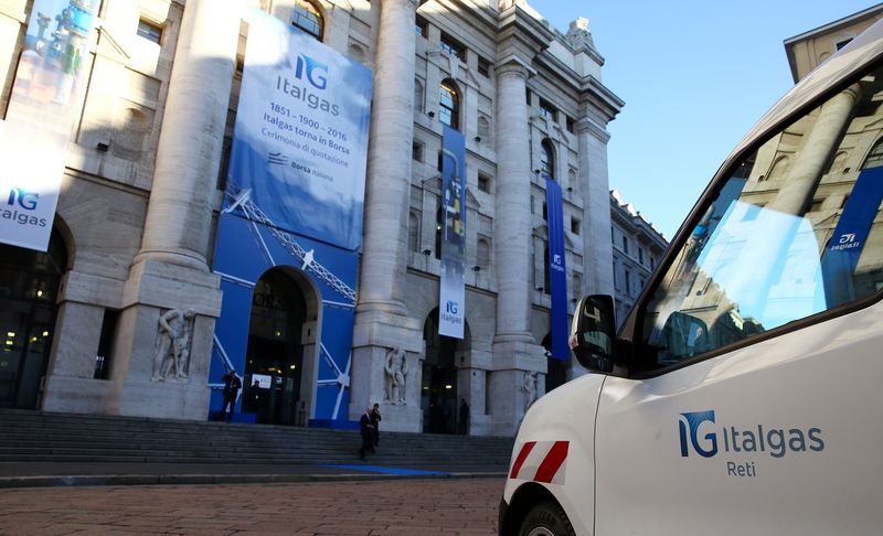 An Italgas vehicle is seen in front of Milan's stock exchange headquater, in Milan