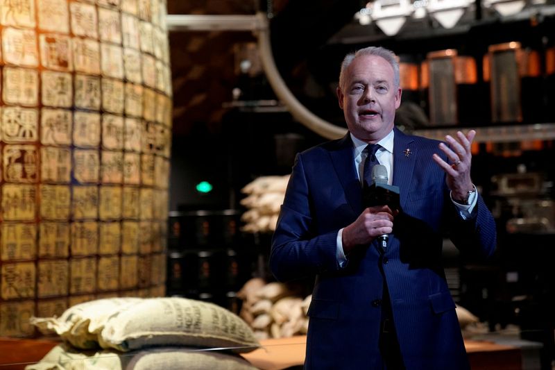 FILE PHOTO: Starbucks CEO Kevin Johnson attends a press conference at the new Starbucks Reserve Roastery in Shanghai