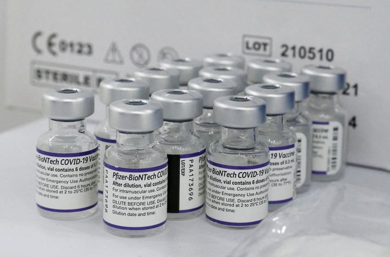 FILE PHOTO: Vials containing the Pfizer/BioNtech vaccine against COVID-19 are displayed at a mobile vaccine clinic, in Valparaiso