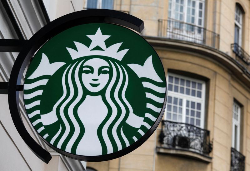 FILE PHOTO: The Starbucks logo is seen outside the new Starbucks cafe in Warsaw