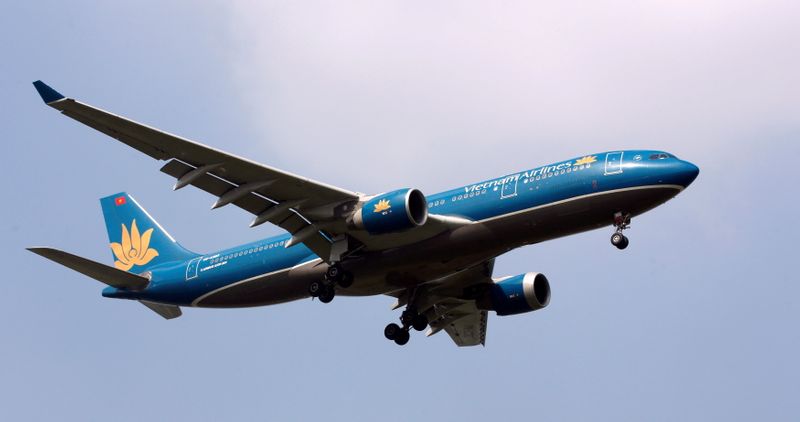 FILE PHOTO: A Vietnam Airlines Airbus A330 plane prepares for landing at Noi Bai airport in Hanoi