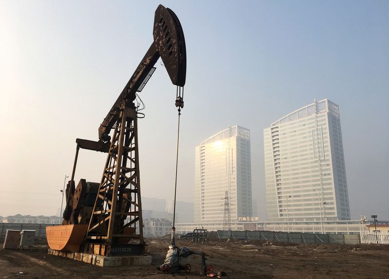 FILE PHOTO: Pumpjack is seen at the Sinopec-operated Shengli oil field in Dongying, Shandong