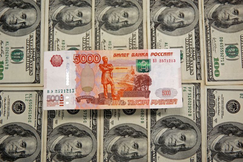 FILE PHOTO: A picture illustration shows U.S. Dollar and Russian Ruble banknotes in Sarajevo