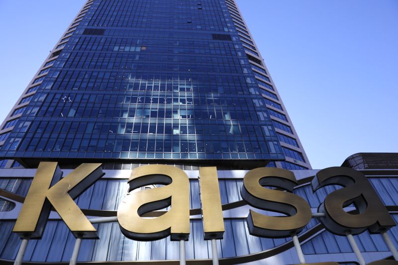 FILE PHOTO: Sign of the Kaisa Plaza, a real estate property developed by Kaisa Group Holdings, is seen near its apartment building in Beijing