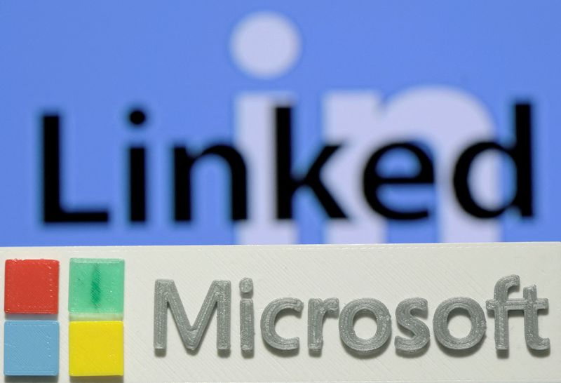 FILE PHOTO: A 3D-printed logo of Microsoft is seen in front of a displayed LinkedIn logo in this illustration