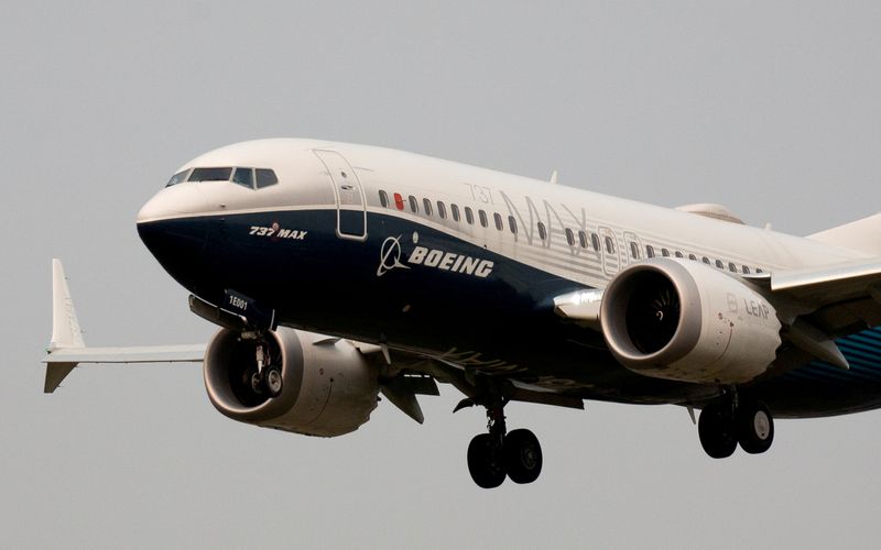 FILE PHOTO: FILE PHOTO: FILE PHOTO: A Boeing 737 MAX aircraft lands during an evaluation flight in Seattle