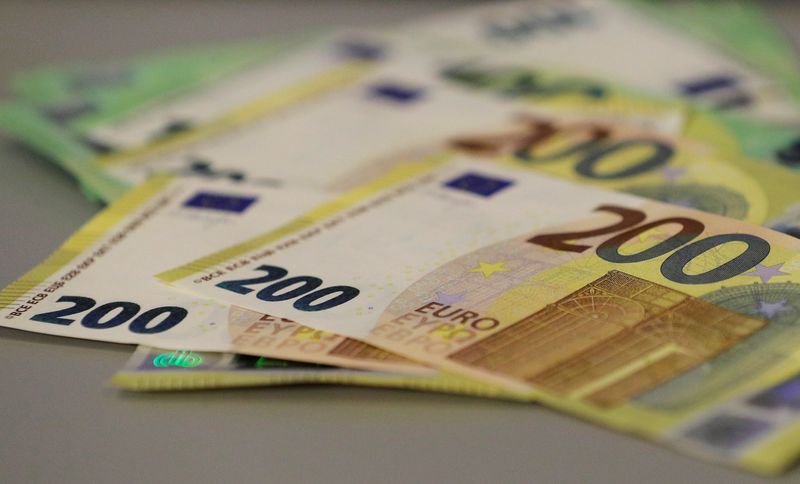 FILE PHOTO: New 100 and 200 euro banknotes are displayed in Vienna