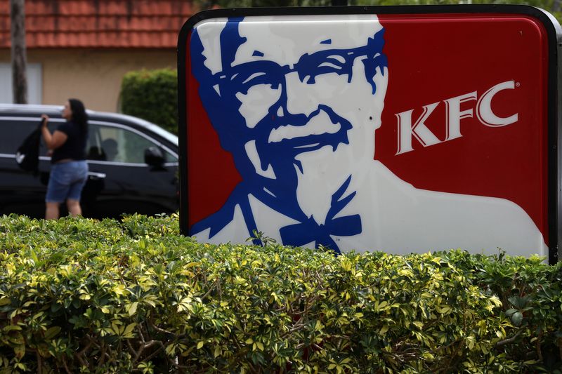 FILE PHOTO: A Kentucky Fried Chicken (KFC) logo is pictured on a sign in North Miami Beach