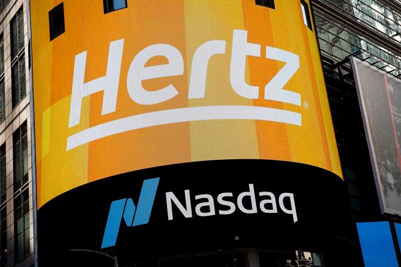 FILE PHOTO: A screen displays the Hertz logo during the Hertz Corporation IPO at the Nasdaq in New York