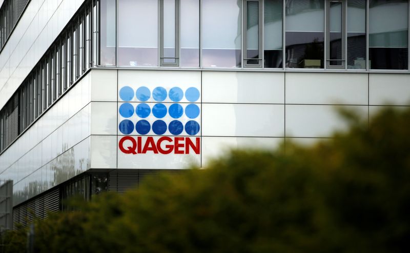 FILE PHOTO: Economy Minister Andreas Pinkwart and Health Minister Karl-Josef Laumann of the German state Northrhine Westphalia visit a testing company Qiagen, in Hilden