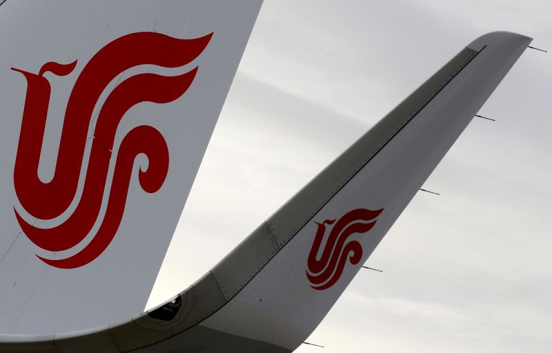 FILE PHOTO: The logo of Air China is pictured on a tail on an airplane parked at the aircraft builder's headquarters of Airbus in Colomiers near Toulouse