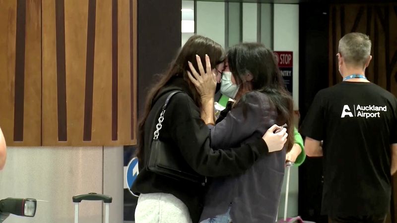 FILE PHOTO: Emotional scenes at Auckland airport as New Zealand welcomes Australian visitors