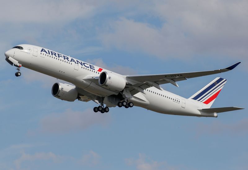 FILE PHOTO: The first Air France airliner's Airbus A350 takes off after a ceremony at the aircraft builder's headquarters in Colomiers near Toulouse