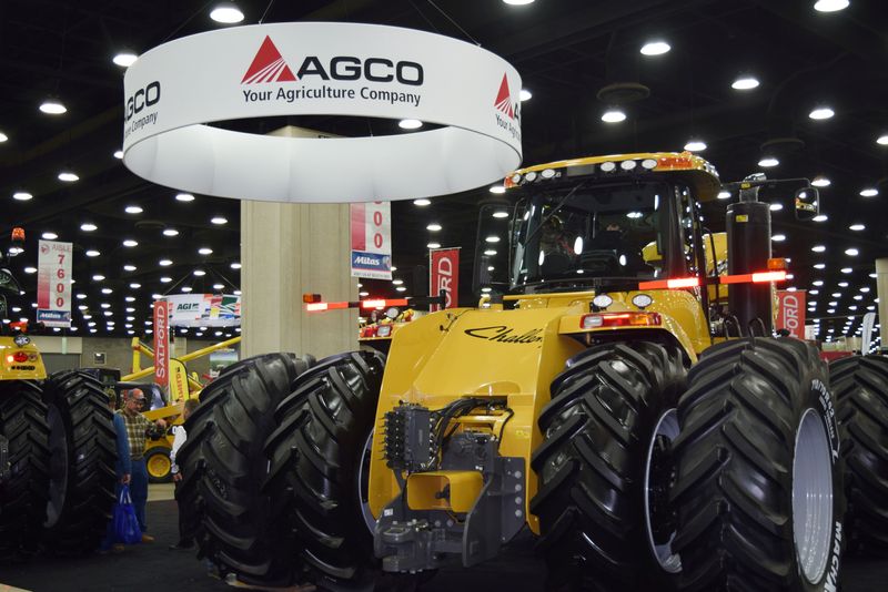 FILE PHOTO: People look at AGCO equipment as they attend National Farm Machinery show in Louisville