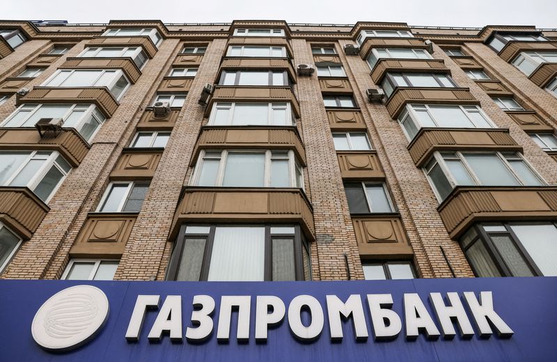 FILE PHOTO: The logo of Gazprombank is seen at a branch office in Moscow