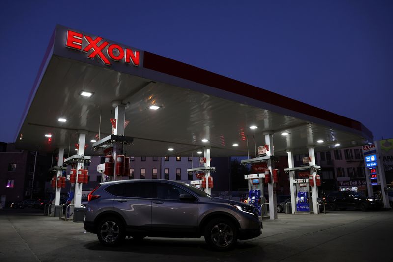 FILE PHOTO: Cars are seen at an Exxon gas station in Brooklyn, New York City