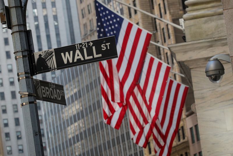 A Wall St. sign is seen outside the NYSE in New York