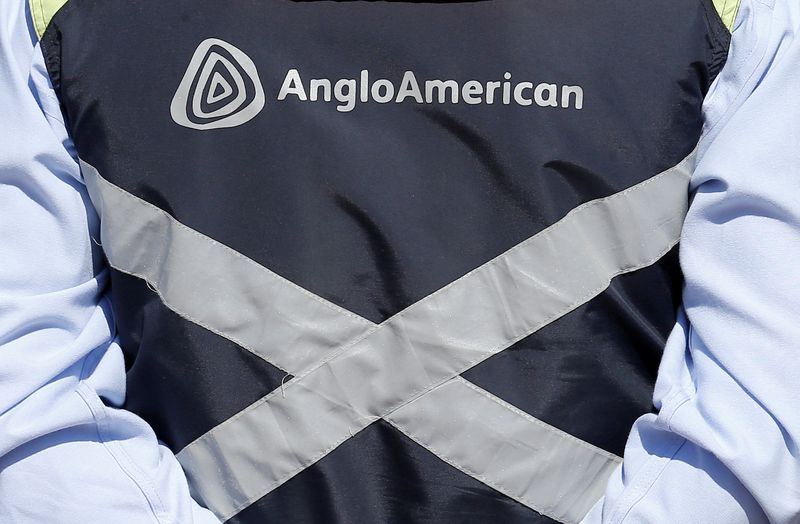 FILE PHOTO: Logo of Anglo American is seen on a jacket of an employee of the Los Bronces copper mine on the outskirts of Santiago