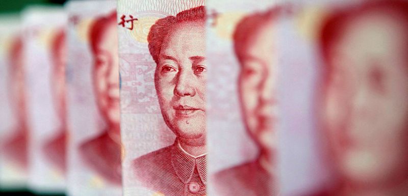 FILE PHOTO: Yuan banknotes are seen in this illustrative photograph taken in Beijing