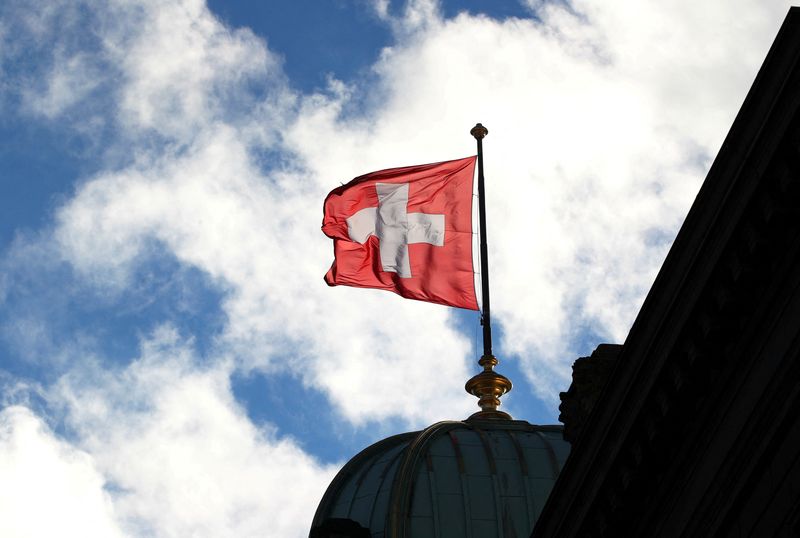 FILE PHOTO: A Swiss flag is pictured on the Federal Palace in Bern