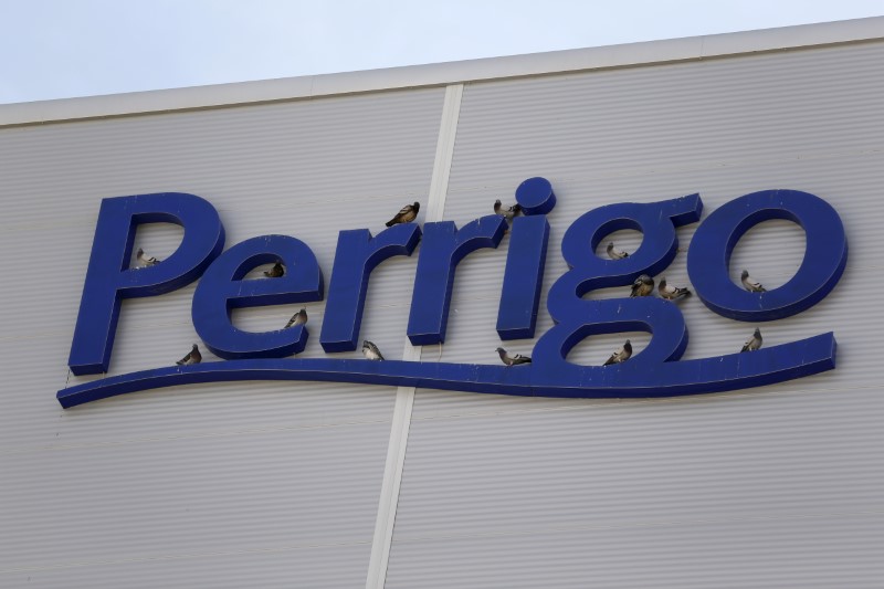 Birds are seen on the logo of generic drugmaker Perrigo Co outside their new factory in the city of Yeruham